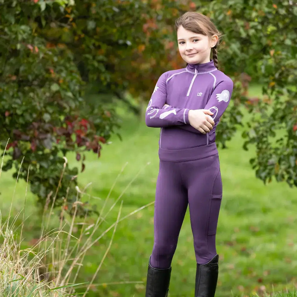 Purple long-sleeved gymkhana riding top with white accents and logo perfect for gymkhana riding and riding tights
