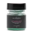 A jar of glamourati stardust glitter in enchantress green with premium cosmetic grade shimmer for showing and plaiting