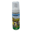 A clear plastic bottle with white pump dispenser labeled foam coat cleanser by global herbs for herbs canine foam use