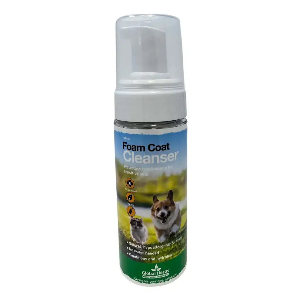 A clear plastic bottle with white pump dispenser labeled foam coat cleanser by global herbs for herbs canine foam use