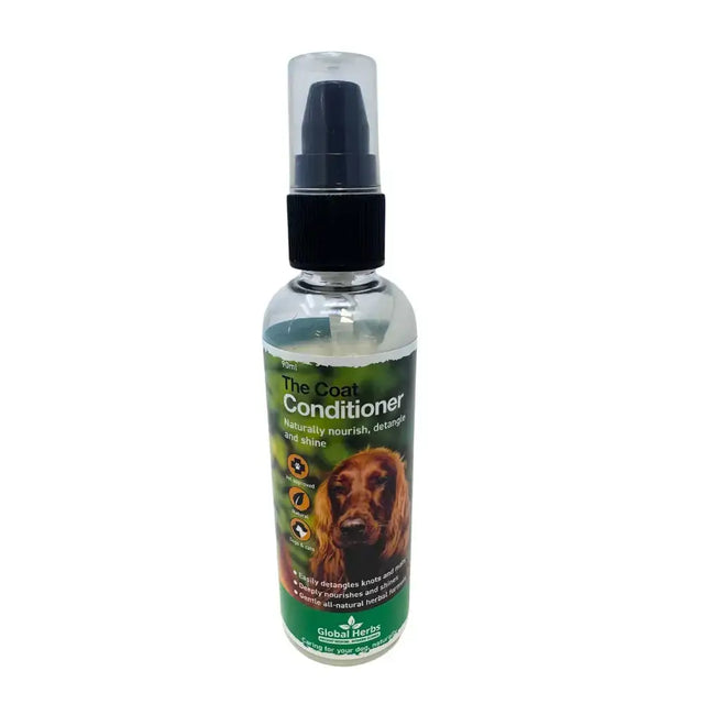 Clear plastic spray bottle with black pump labeled the coat conditioner by global herbs canine for pet care use