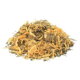 A pile of dried herbs marigold and cleavers in yellow orange and brown for horses rich care by global herbs