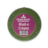 Olive green circular container of global herbs mud-x cream with textured rim and purple label for muddy winter conditions
