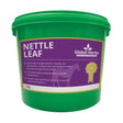 Green plastic bucket with purple label of global herbs nettle leaf herbal supplement for natural wellness use