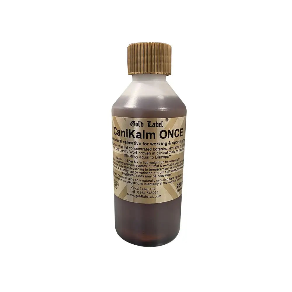 A clear plastic bottle with gold label canikalm quick natural calmative dog supplement in dark brown liquid and gold cap