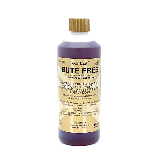 A 500ml clear plastic bottle of gold label canine bute free purple liquid supplement with a gold screw cap