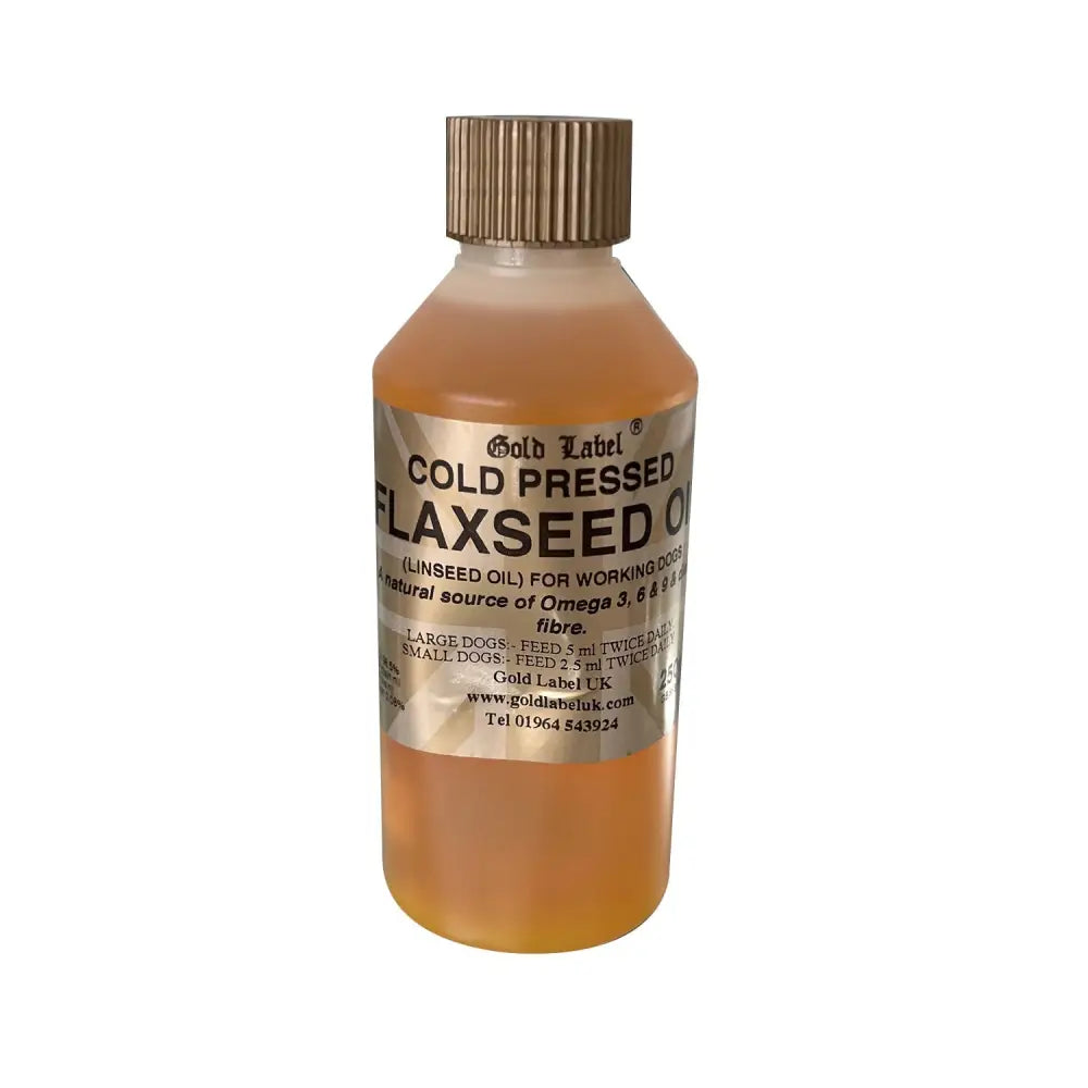 A clear plastic bottle with ribbed gold cap contains raw cold pressed amber canine flaxseed oil gold label canine flaxseed