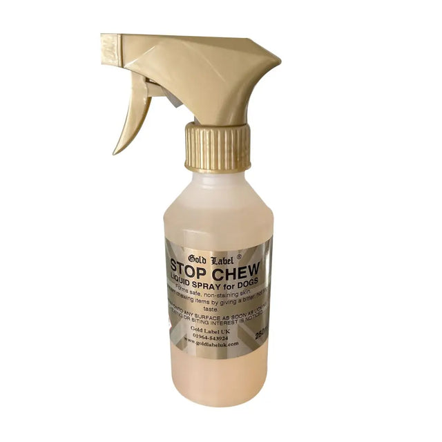 Gold label canine stop chew spray in a translucent bottle with gold trigger and cap to deter dogs from chewing