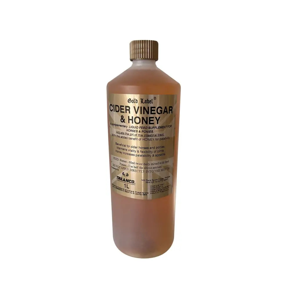 A 1-liter gold label cider bottle with translucent amber label cider vinegar and honey sealed with a gold cap for laminitic horses