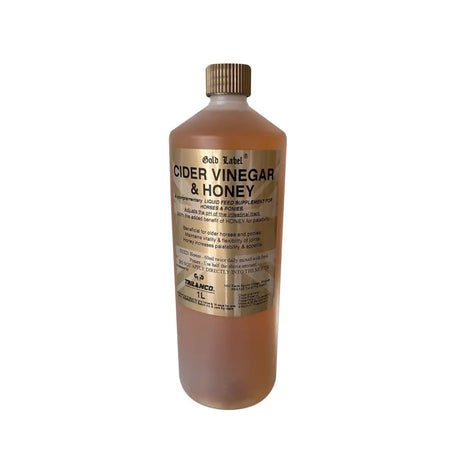 A 1-liter gold label cider bottle with translucent amber label cider vinegar and honey sealed with a gold cap for laminitic horses