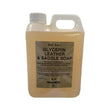 A 2-liter translucent jug of trilanco gold label glycerin leather and saddle soap liquid in pale yellow for easy apply liquid saddle use