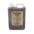 A 2.5l translucent plastic jug of gold label lavender wash filled with pleasant smelling lavender liquid for horse body wash