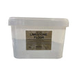 A clear plastic container of gold label limestone flour filled with white powder labeled 5kg for lactating mares