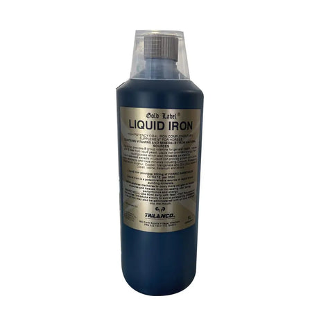 Dark blue plastic bottle with clear cap labeled gold label liquid iron by trilanco nutritional liquid supplement for worm infestation
