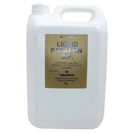White plastic jug of trilanco gold label liquid paraffin 5l for horses with gold-colored label sticker