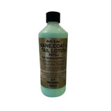 A translucent light green bottle of gold label mane tail and coat lotion refill with black cap and gold label