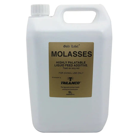 White plastic jug with handle and cap labeled gold label molasses by trilanco containing highly palatable liquid molasses