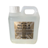 Clear plastic jug with white cap and handle labeled gold label pig oil for horse grooming and preventing mud-borne infections
