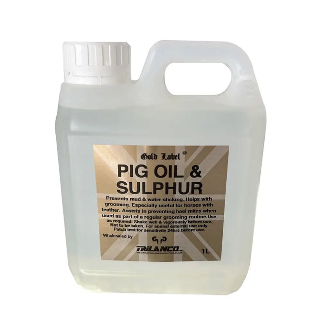 Clear plastic jug with white cap and handle labeled gold label pig oil for horse grooming and preventing mud-borne infections
