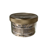 Gold label pink ointment plus msm in a 200g clear glass jar with metallic gold lid for reformulated traditional pink care
