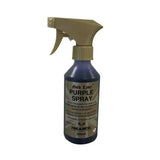 Purple liquid spray bottle with beige trigger labeled gold label purple spray by trilanco for minor cuts care
