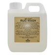 White plastic jug with gold label rug wash for horse rug wash by trabanco holding 1l for stable rugs cleaning