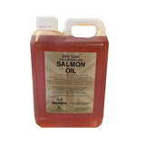 A 2-liter plastic jug of gold label salmon oil with white cap filled with amber liquid to support wound healing