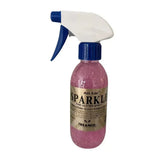 Gold label sparkle pink glitter spray in a clear bottle with blue and white trigger sprayer by trilanco