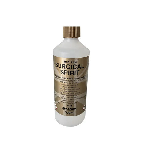 A 500ml bottle of gold label surgical spirit with a gold screw cap and brown label featuring white text