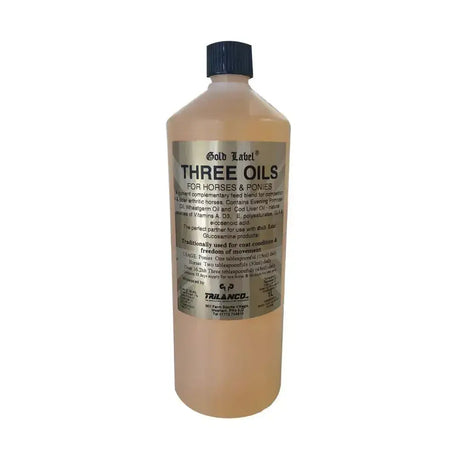 A translucent amber liquid in a 1-liter plastic bottle with black cap labeled gold label three oils for horses by trilanco