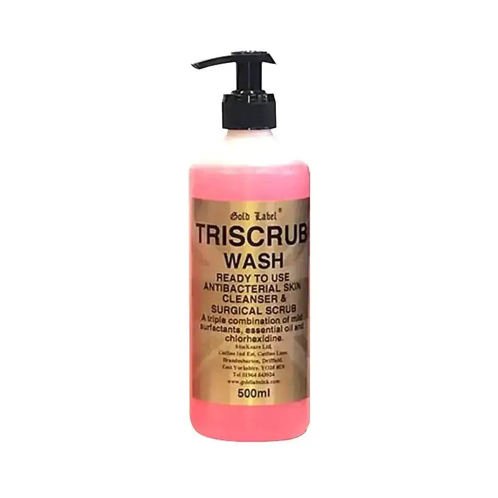 Pink liquid-filled gold label triscrub wash bottle with black pump dispenser for easy skincare use