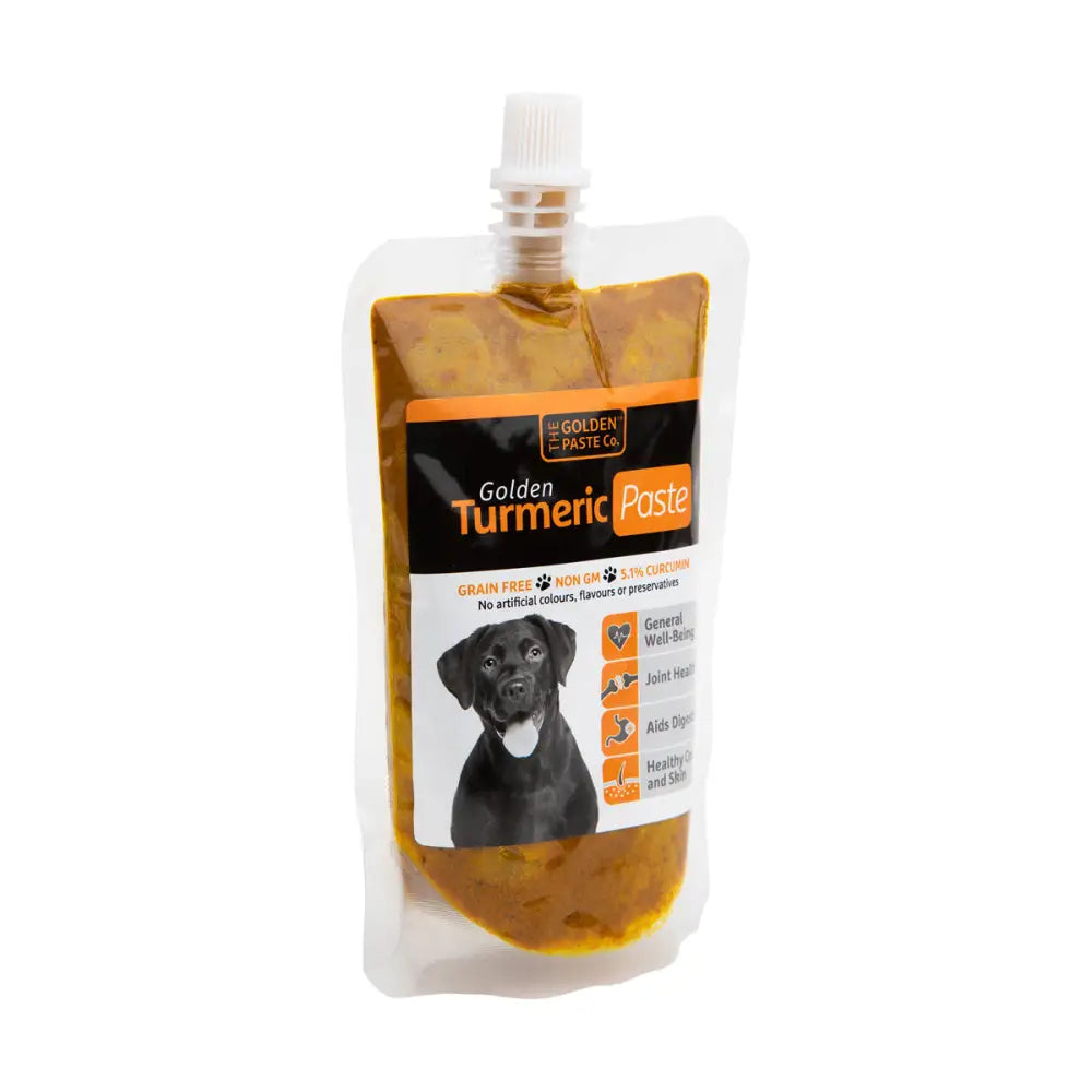 Golden paste turmeric paste in a clear pouch with black dog label made with apple cider vinegar and black pepper