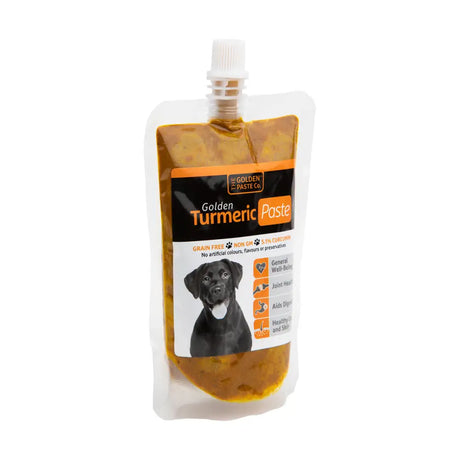 Golden paste turmeric paste in a clear pouch with black dog label made with apple cider vinegar and black pepper