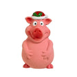Pink rubber good boy smiley christmas pig toy wearing a red and white santa hat with green holly