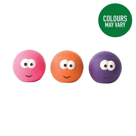 Three colorful good boy squeaky face balls in pink orange and purple with cartoon faces made of rubber for dogs