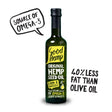 A dark green glass bottle of good hemp original hemp seed oil with a black cap and yellow label with white text