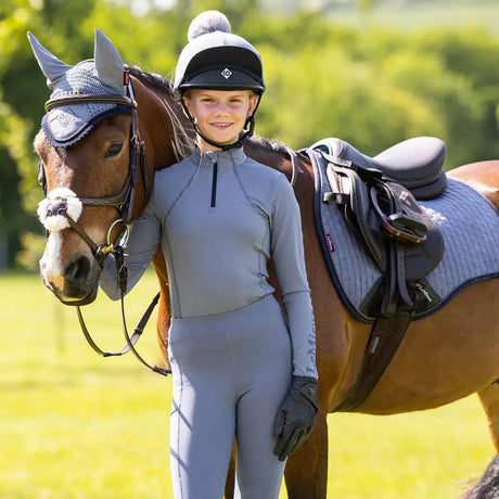 Gray equestrian riding outfit with black zipper and subtle branding on the sleeve.