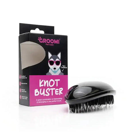 Black glossy plastic pet brush with dense bristles from groomi pet care the knot buster for easy pet care grooming