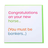 A white greeting card from gubblecote humourous wordy range with lime green border and colorful congratulations text