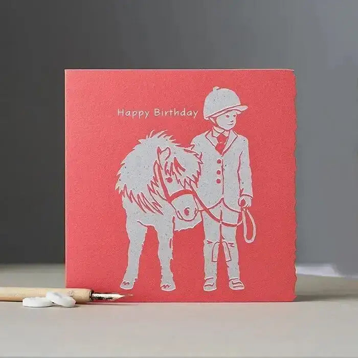 Happy birthday card child with pony coral red textured design with white embossed equestrian illustration and unique die-cut edging