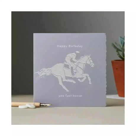 Happy birthday card race horse in light gray matte with unique die-cut jockey silhouette and natural fleck background