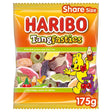 A vibrant orange and yellow plastic bag of haribo tangfastics candy with a cartoon bear perfect for tuck shop treats