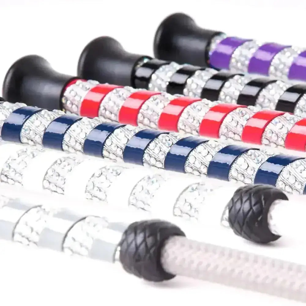 Harlequin crystal riding crop with colorful crystal encrusted handles in red blue purple and silver and black grips