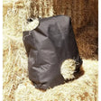 Black canvas harlequin haybag with two circular openings for easy horse feed access