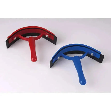 Red and blue harlequin plastic sweat scraper brushes with black rubber blades and smooth plastic edge for grooming