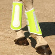 Bright lime green harlequin reflective brushing boots with white accents neoprene and suede strike pad details