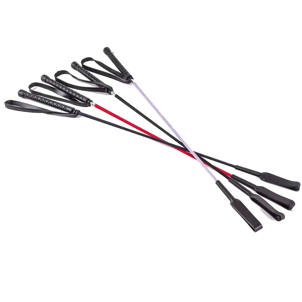Set of five harlequin riding crops with black leather whips and red silver shafts featuring loop handles