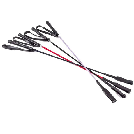 Set of five harlequin riding crops with black leather whips and red silver shafts featuring loop handles