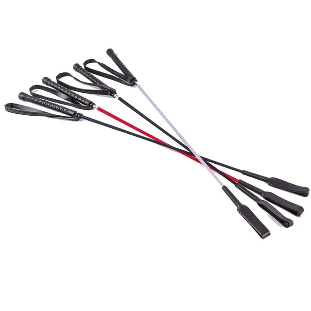 Set of five harlequin riding crops with black leather whips and red silver shafts featuring loop handles