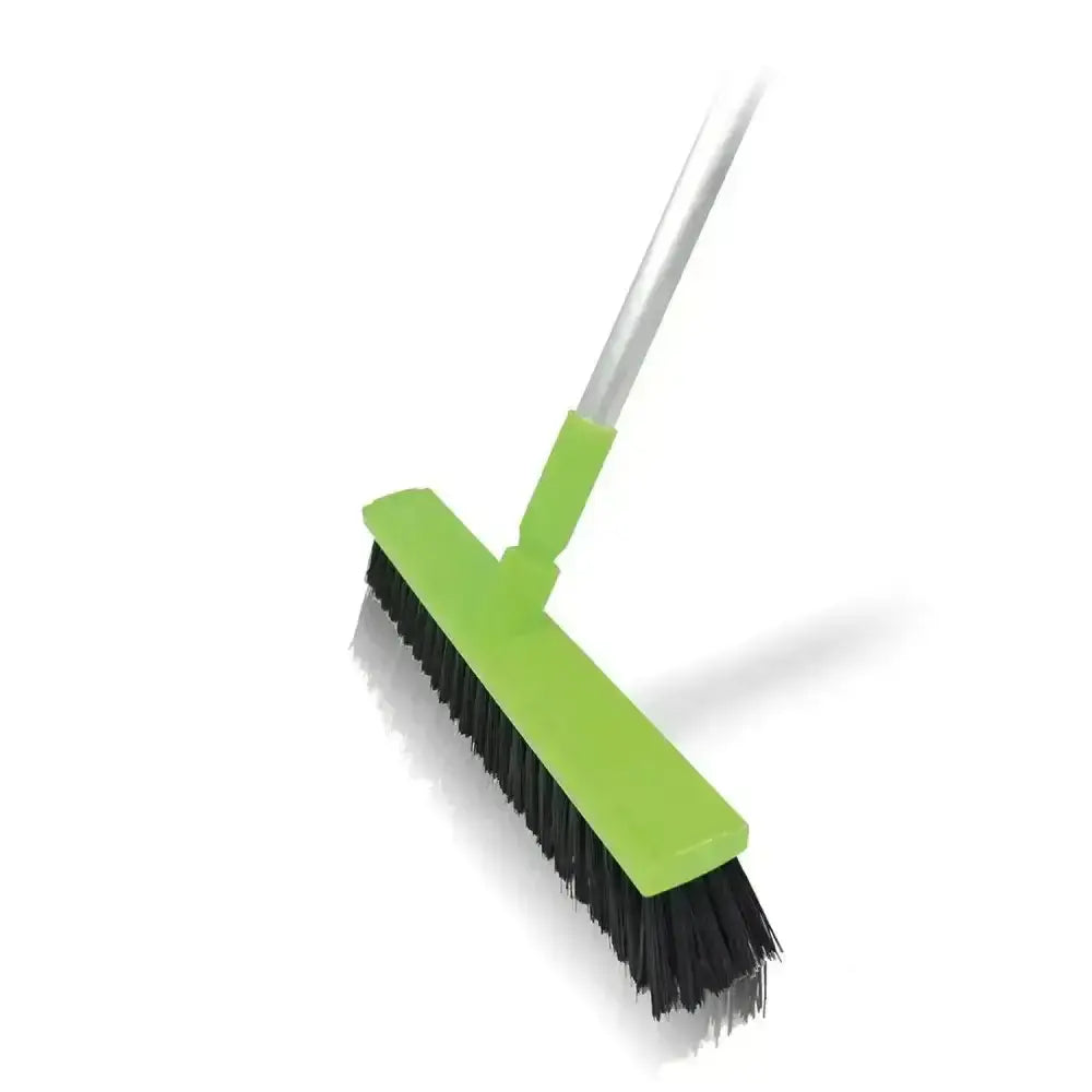 Bright green harold moore stable floor brush with black bristles and silver handle using advanced bristle technology for professional equine environment